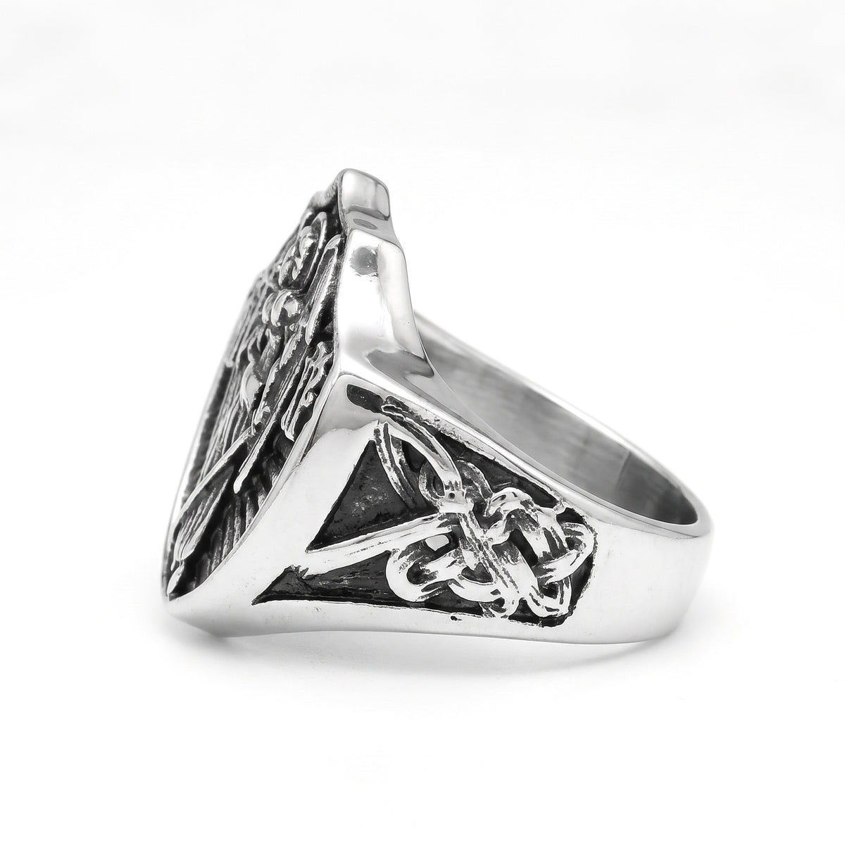 Archangel Michael shield signet ring in stainless steel, side view showing the knotwork shoulder on white background