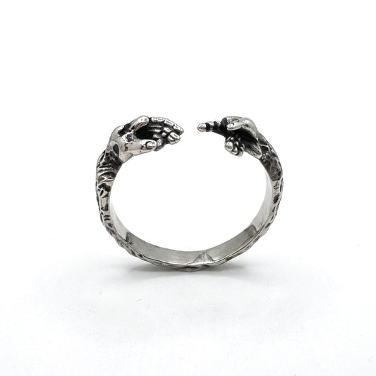 Ascension hands of God open stainless steel ring, front view on white background