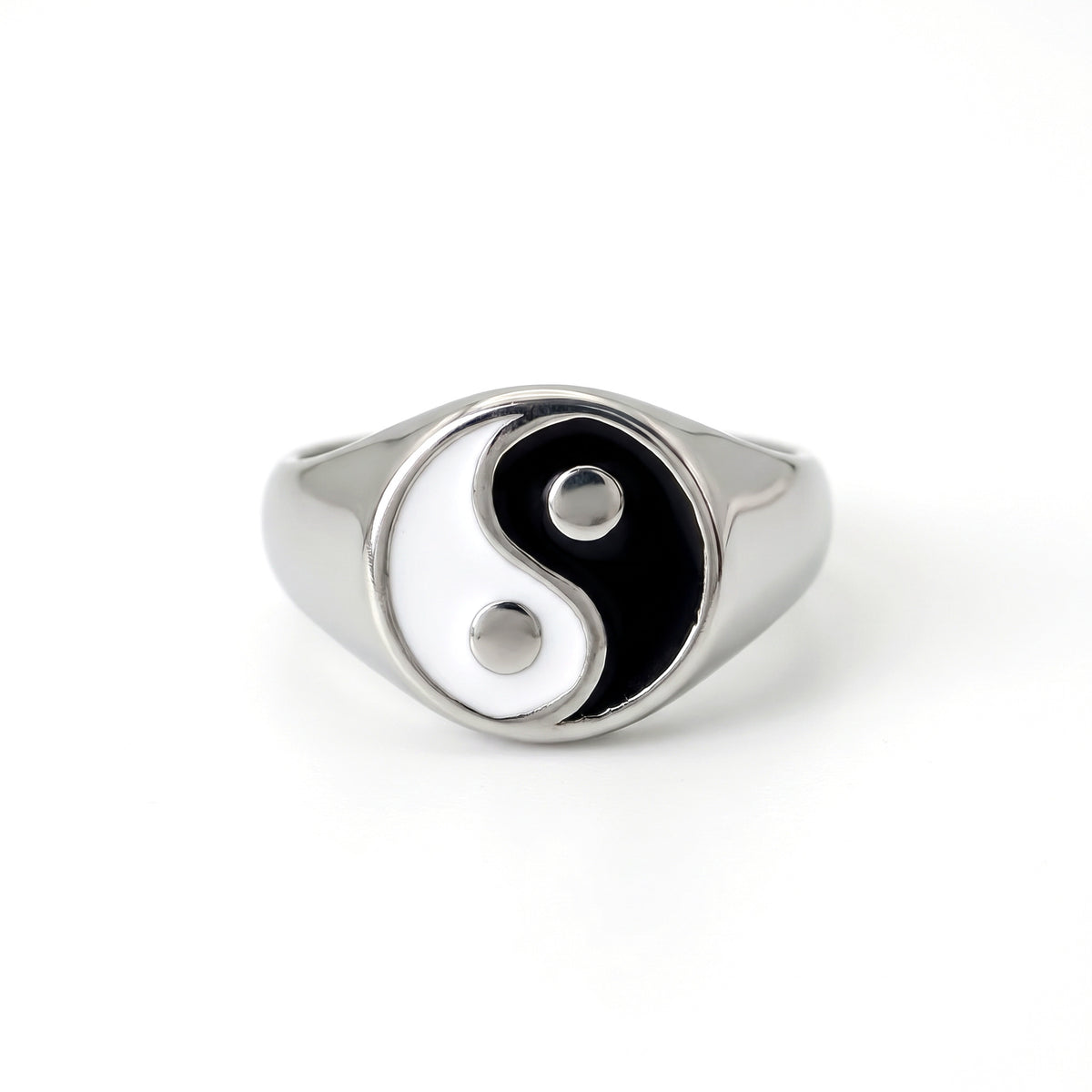 Eclipse yin-yang signet ring in stainless steel, front view on white background
