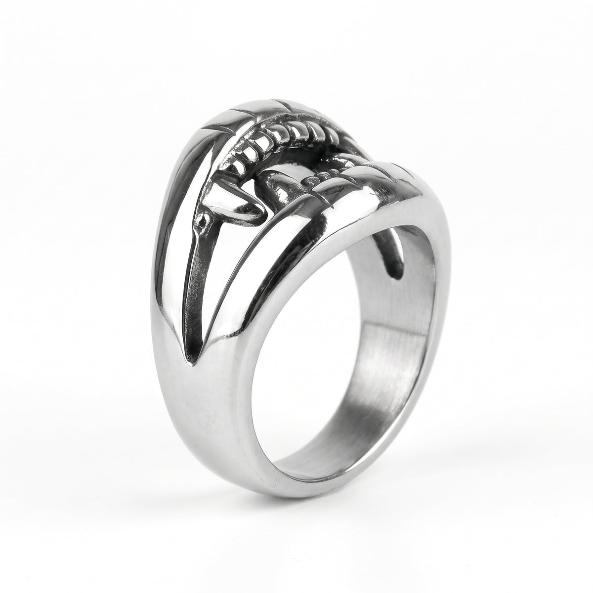 Fang devil mouth stainless steel ring, side view on white background