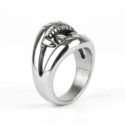 Fang devil mouth stainless steel ring, side view on white background