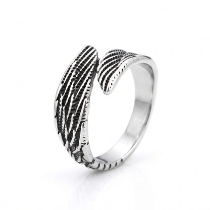 Seraph winged open stainless steel ring, side view on white background