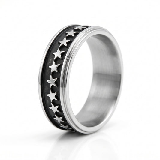 Stellar star band ring in stainless steel, front view on white background