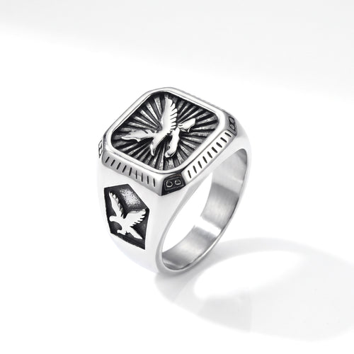 Talon winged eagle signet ring in stainless steel, front view on white background