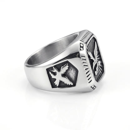 Talon winged eagle signet ring in stainless steel, side view showing the eagle on the shoulder on white background