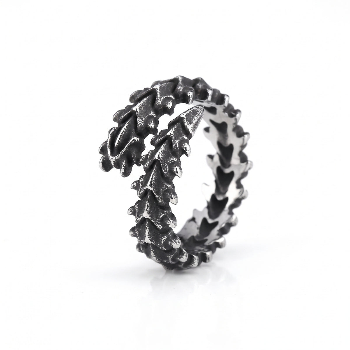 Vertebra dragon bone wrap ring in stainless steel, front view on white background