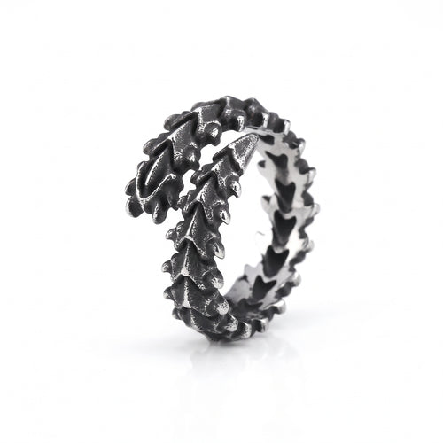 Vertebra dragon bone wrap ring in stainless steel, front view on white background