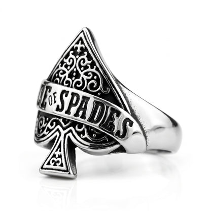 Wildcard ace of spades stainless steel ring, side view on white background